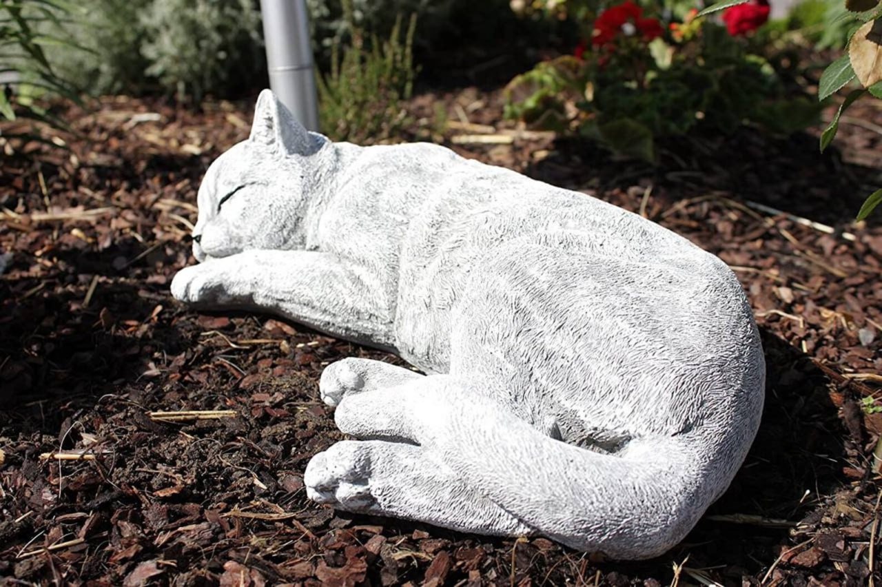 Resting kitty garden statue